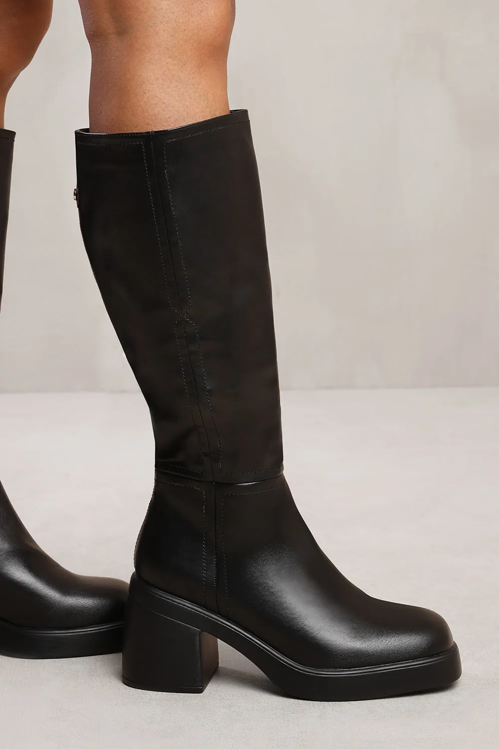 MADDIE BELOW KNEE BOOT WITH CHUNKY HEEL IN BLACK FAUX LEATHER